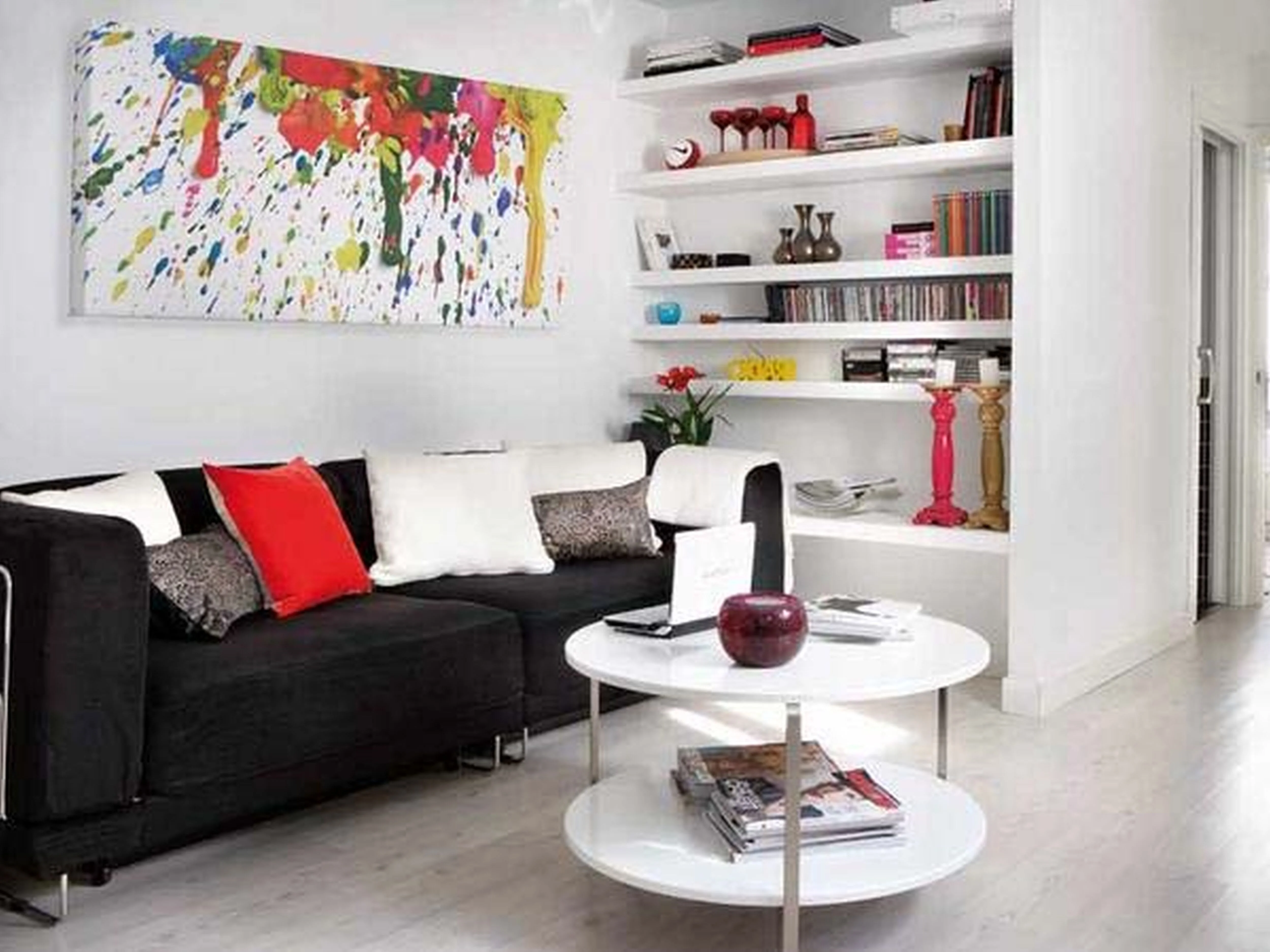 Interior Cute Decorating Ideas White Small Apartment Living Room Decorating Black Sofa And White Round Coffee Table Design Ideas Interior Design Inside Design Ideas With Black Sofa